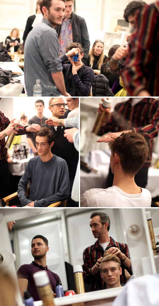 Staff are briefed and models get their hair done backstage