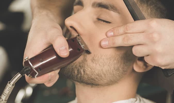 Trim your beard to give appearance of even growth