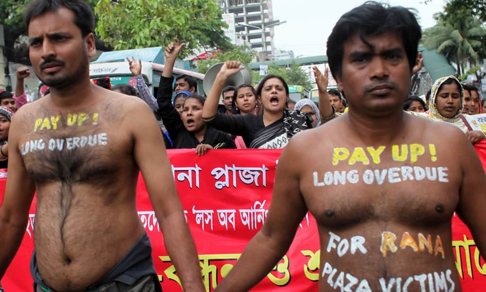 Protestors in Dhaka, Bangladesh, demand compensation for victims of the Rana Plaza building collapse on its second anniversary