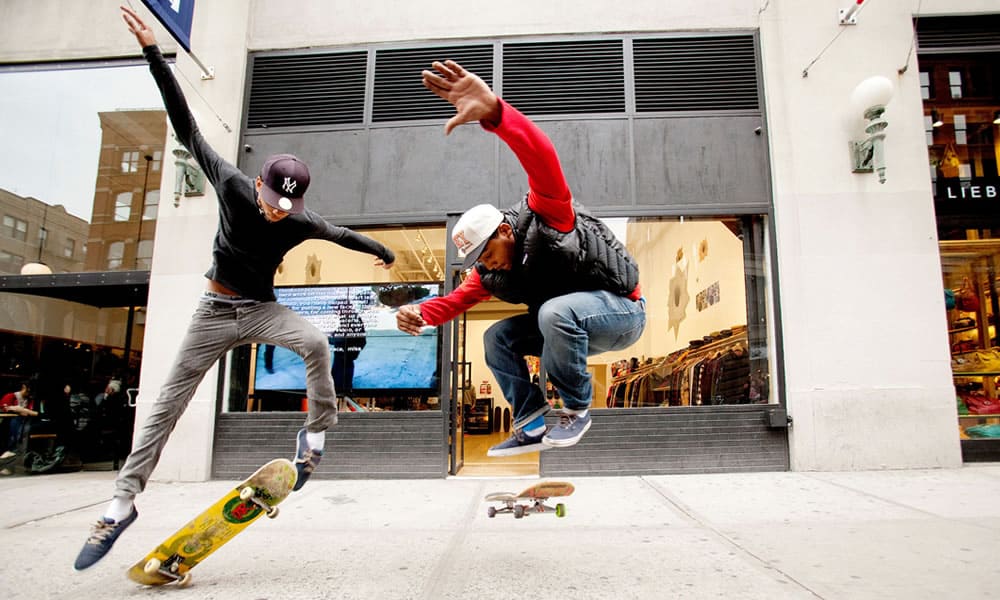 Skateboarders outside the Lafayette Street Supreme store