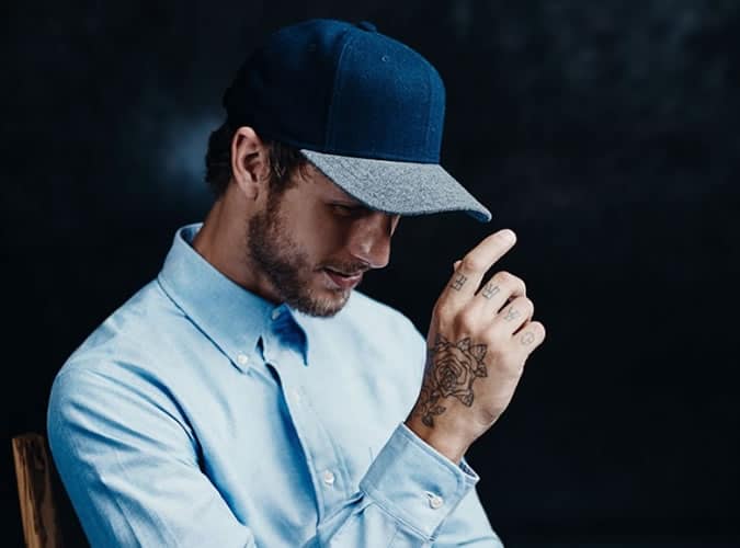 A baseball cap looks good with any casual look