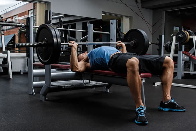 Man Performing A Bench Press