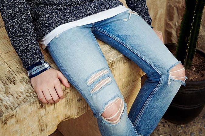 Skinny jeans and ripped knees are a no-no