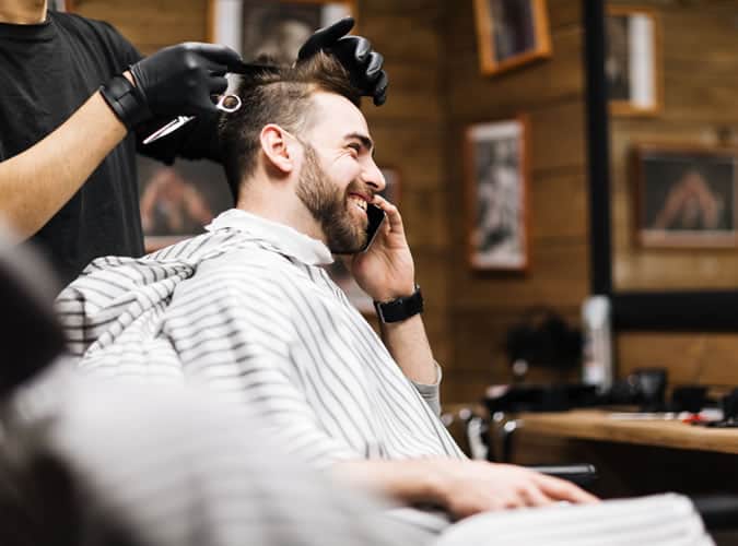 During your haircut, don't use your mobile phone