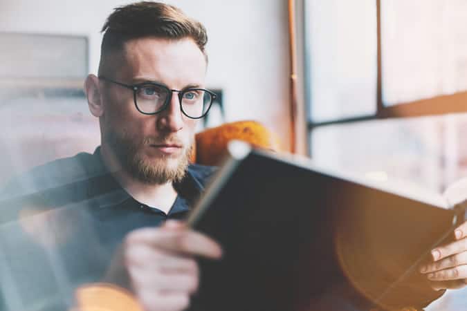 Man reading books