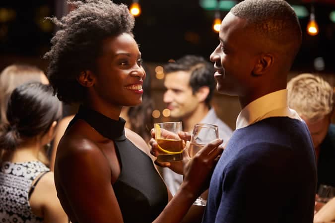 Couple talking in bar
