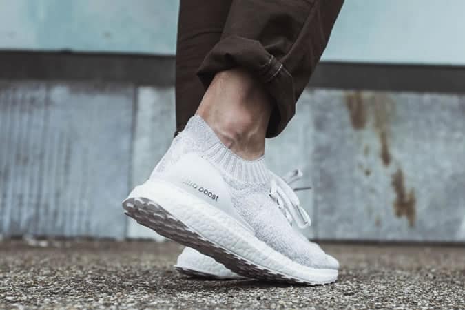 Adidas ultraBOOST Uncaged Triple White 2.0 on feet
