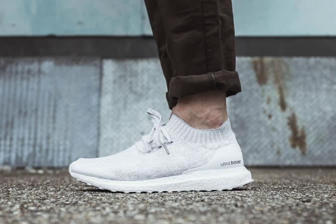 Adidas ultraBOOST Uncaged Triple White 2.0 on feet