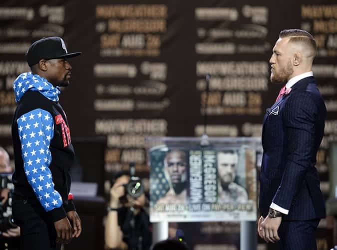 Floyd Mayweather and Conor McGregor promoting their fight in LA