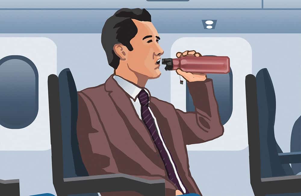 Invest in a water bottle that you can fill at the airport - travel hacks