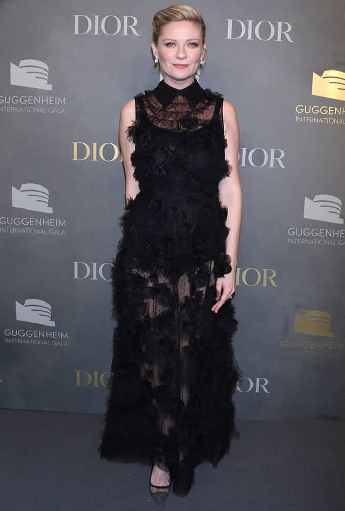 Kirtsen Dunst Wearing A Black Feathered Dress