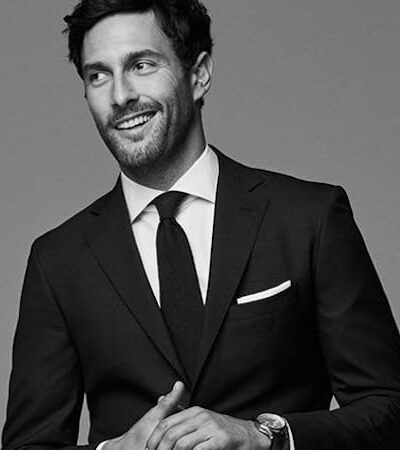 6 Looks That Prove The Black Suit Is Back
