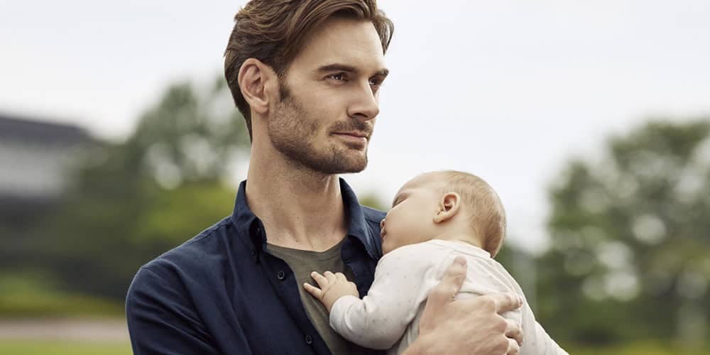 Stylish Dad With A Baby