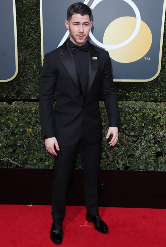 The Best All-Black Outfits From The Golden Globes