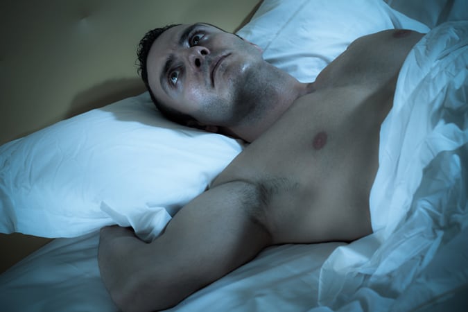 Man Lying Awake At Night