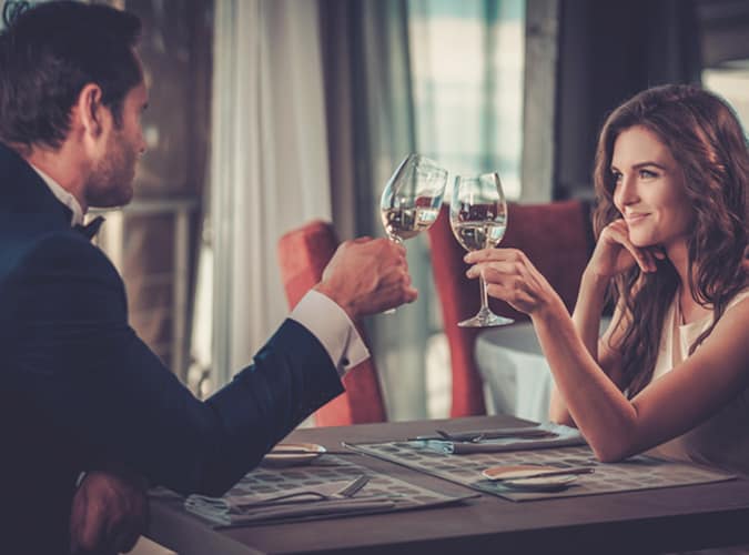 Couple Having Dinner At A Restaurant