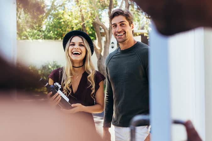 Couple Checking In On Flat Rental