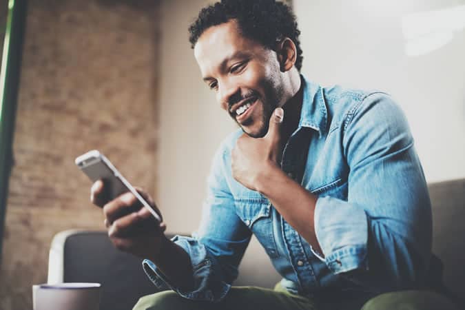 Man Using A Mobile Phone