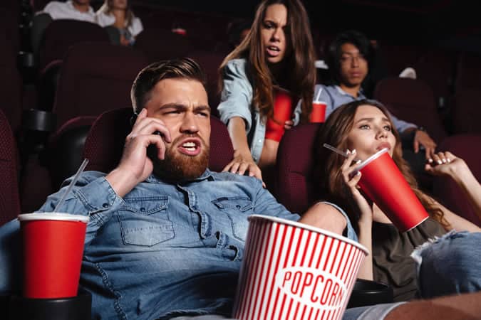 People Arguing At A Cinema