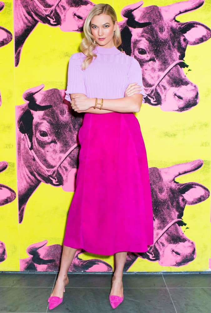 Karlie Kloss Wearing A Pink Skirt And Top
