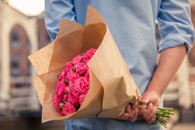 Man Holding Flowers