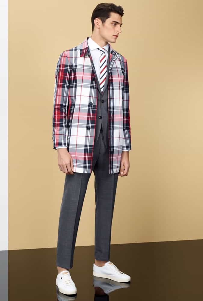 Man Wearing A Bright Check Overcoat