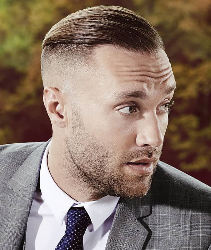 Slick back comb over fade undercut hairstyle for men