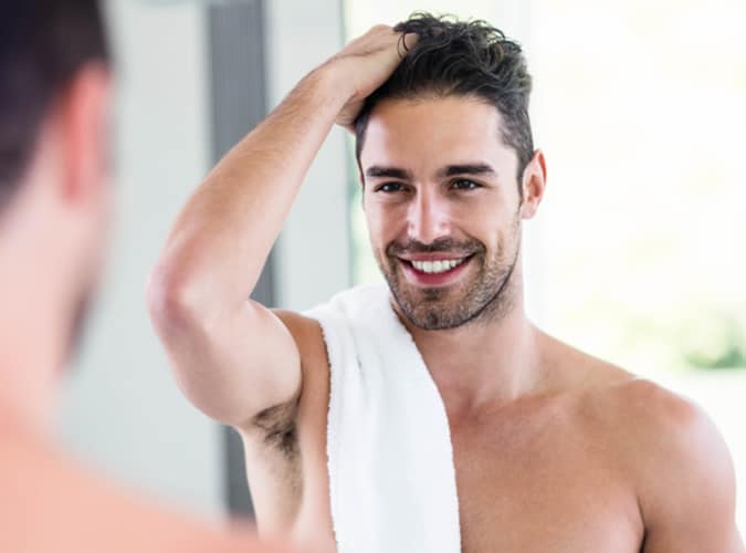 Man Running His Hand Through His Hair