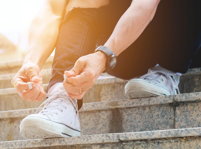 Man Tying His Laces
