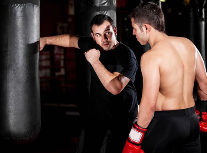 Man teaching boxing