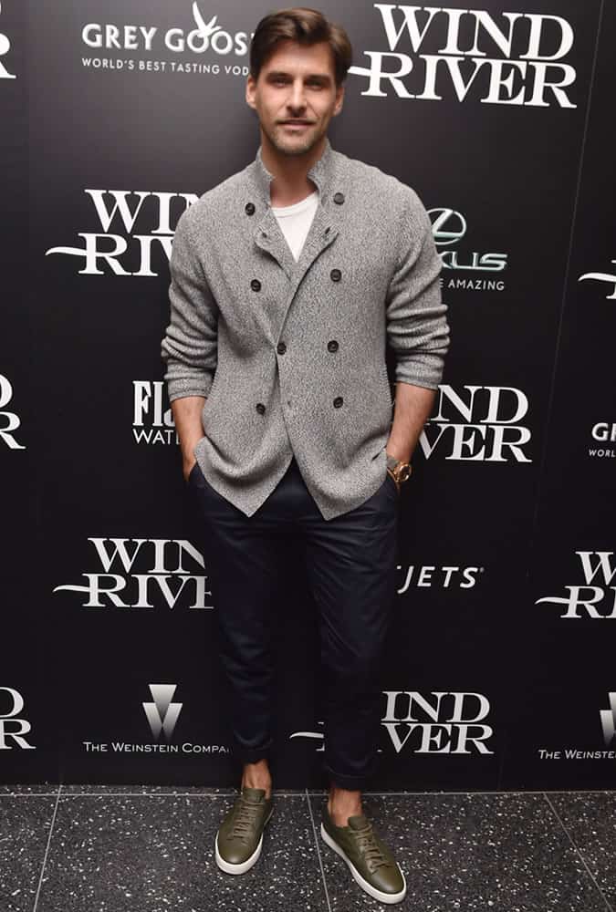 Johannes Huebl in a cardigan, chinos and sneakers