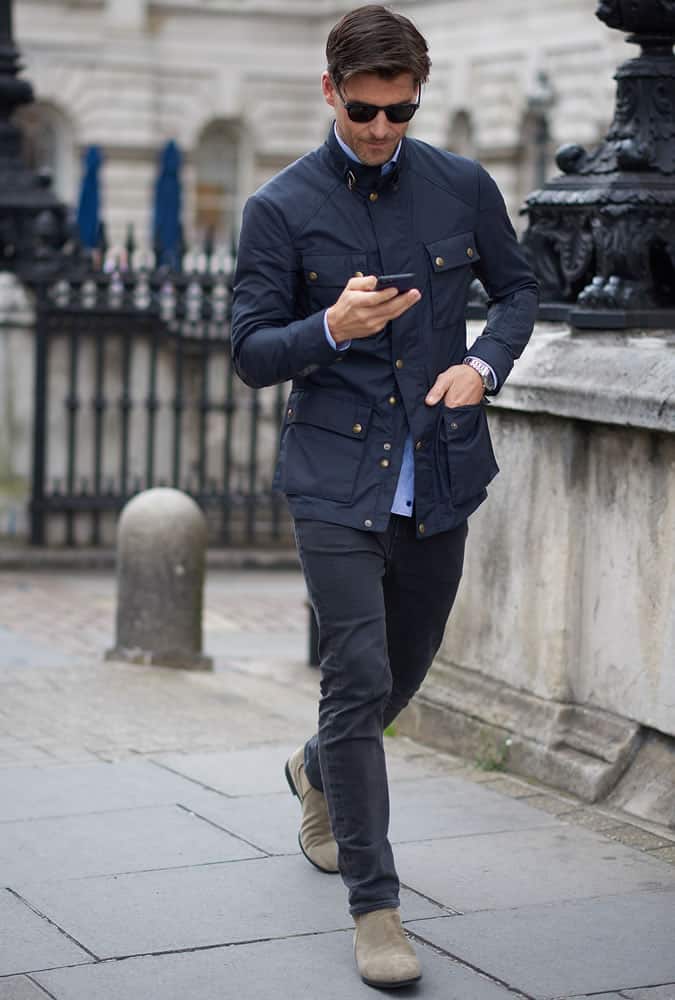 Johannes Hubel wearing a field jacket and jeans