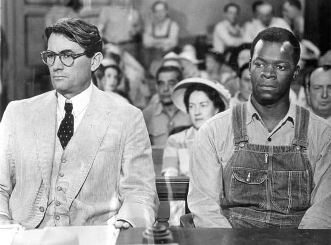 Gregory Peck wearing a seersucker suit as Atticus Finch in To Kill a Mockingbird (1962)