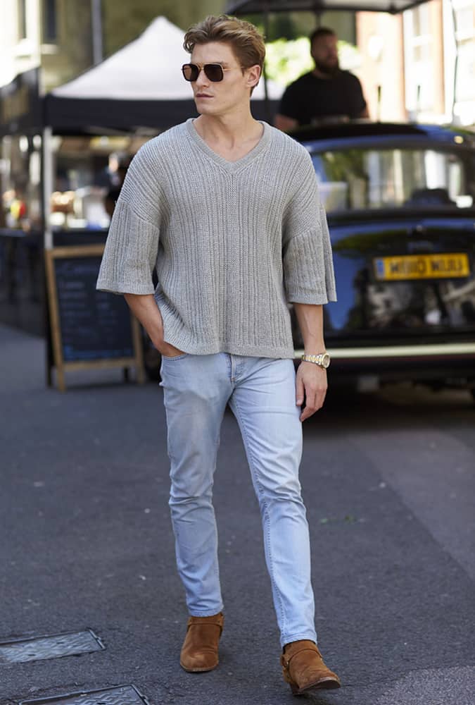 Oliver Cheshire Wearing A Poncho