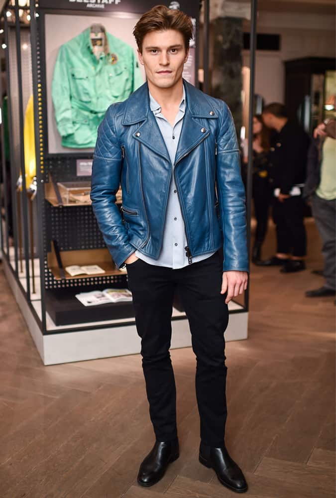 Oliver Cheshire Wearing A Blue Biker Jacket