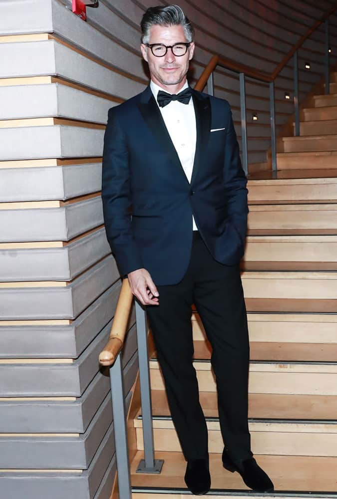 Eric Rutherford Wearing A Blue Tuxedo