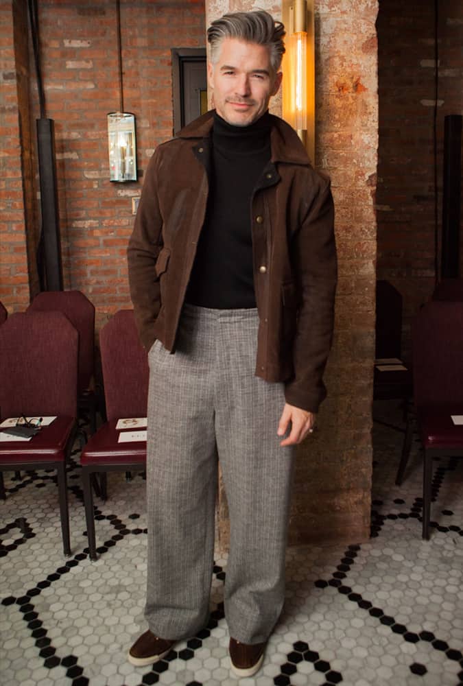 Eric Rutherford Wearing A Bomber Jacket
