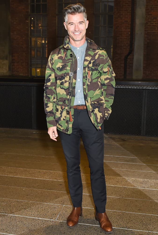 Eric Rutherford Wearing A Camo Jacket