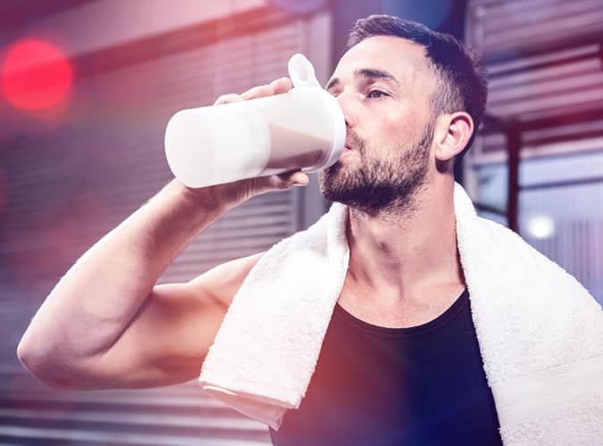 Man Drinking A Protein Shake