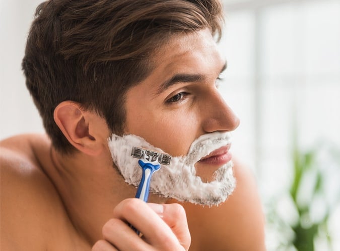 A Man Shaving