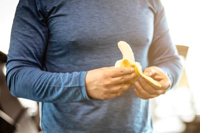 Sportsman Eating A Banana