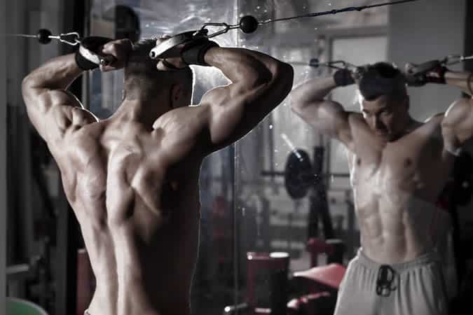 Man exercising on a cable machine