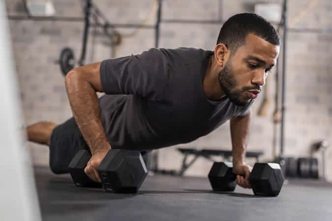 Man exercising with dumbells