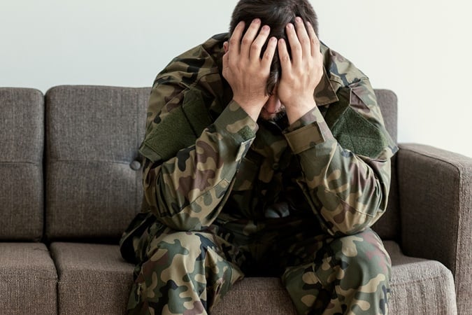 Soldier sitting on the sofa