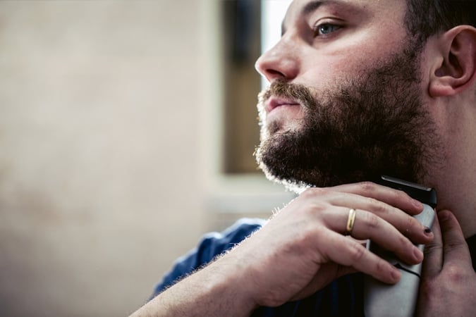 Man Using Beard Trimmer