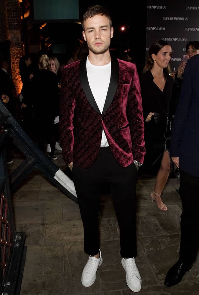 Liam Payne wearing a red dinner jacket at London Fashion Week