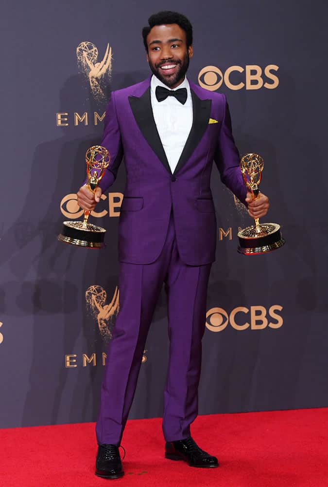 Donald Glover wearing a purple tuxedo at the 69th Emmy Awards