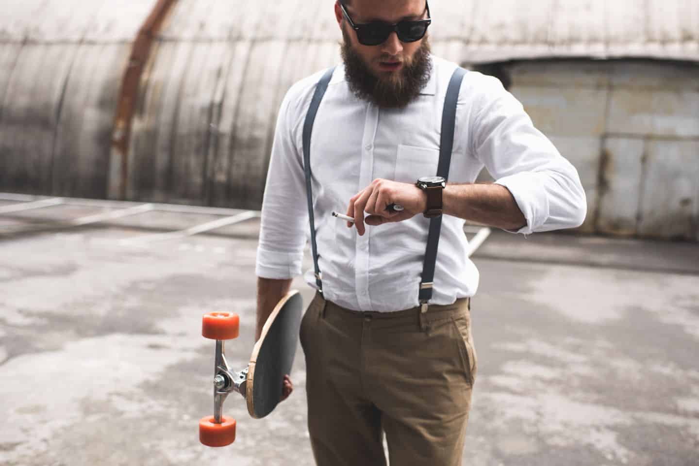 Man modeling how to wear Suspenders