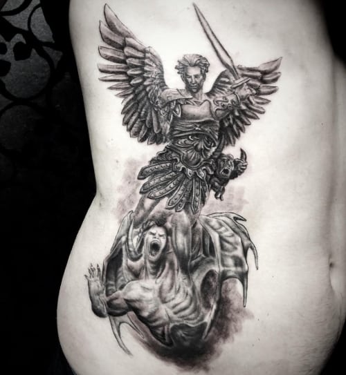 Angel Fighting Demons Tattoo