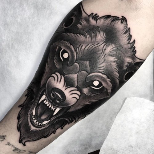 Angry wolf tattoo 